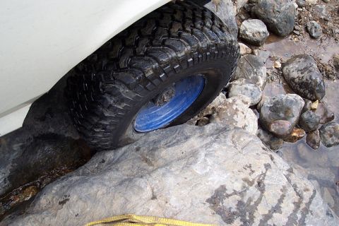 1987 Ford Bronco - maybe a set of bead locks is needed, the tire held on for some reason
