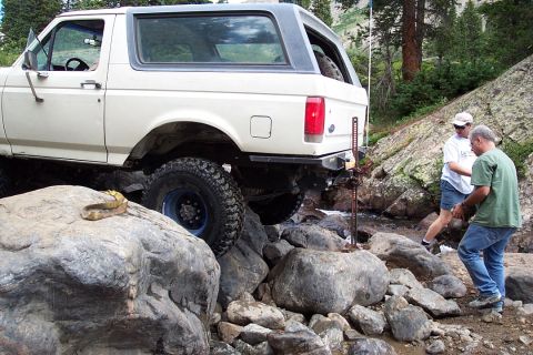 1987 Ford Bronco - somehow i ended up on a diffrent rock and required the entire back end lifted up and a wincing from the front