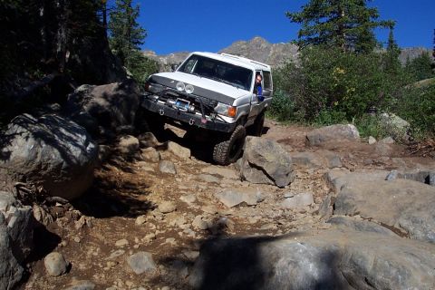 1987 Ford Bronco - keith hit his driver and passanger side door comming down french creak