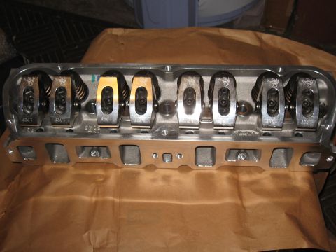 1994 Ford Bronco - Close-up of an engine cylinder head, showing rocker arms and valve springs.