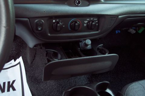 2001 Ford Crown Victoria - Interior view of a 2001 Ford Crown Victoria, highlighting the dashboard and center console features.