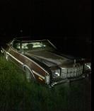 1974 Ford Elite - This 1974 Ford Elite coupe is seen from a three-quarter front view at night.