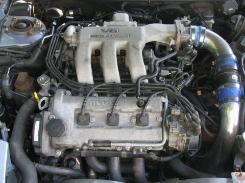 1994 Ford Probe - Engine bay view of a Mazda V6 DOHC 24-valve engine.