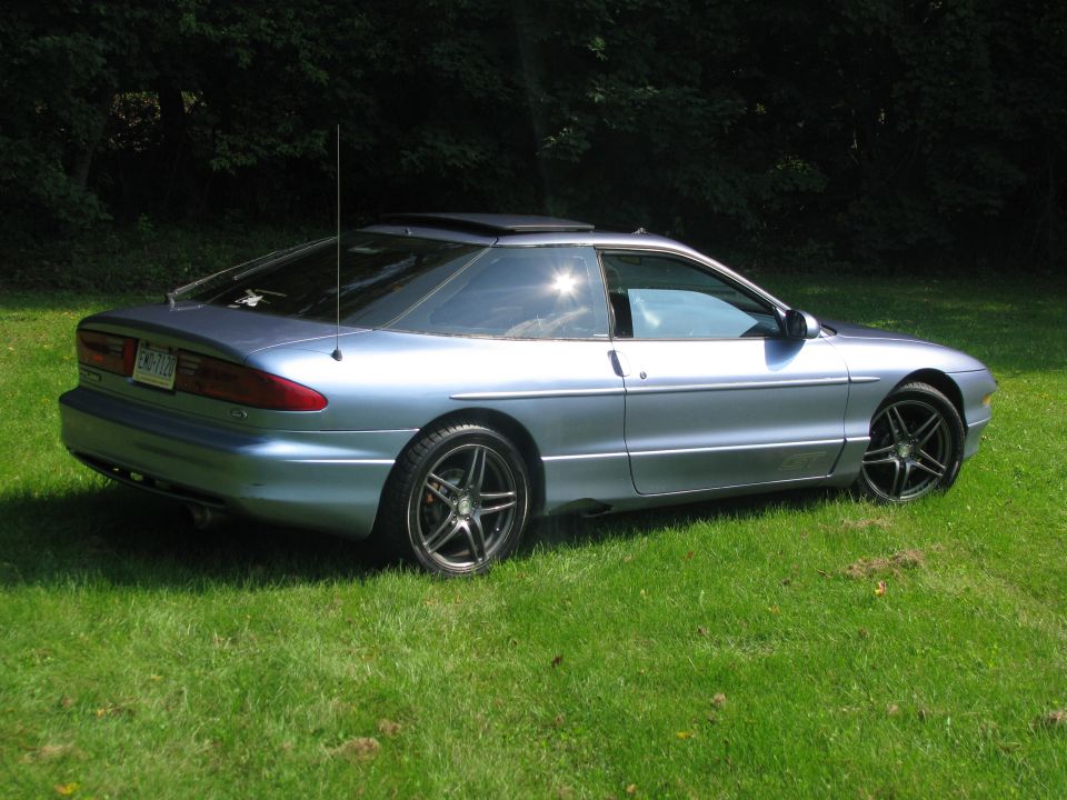 Light blue 1994 Ford Probe coupe, rear three-quarter view