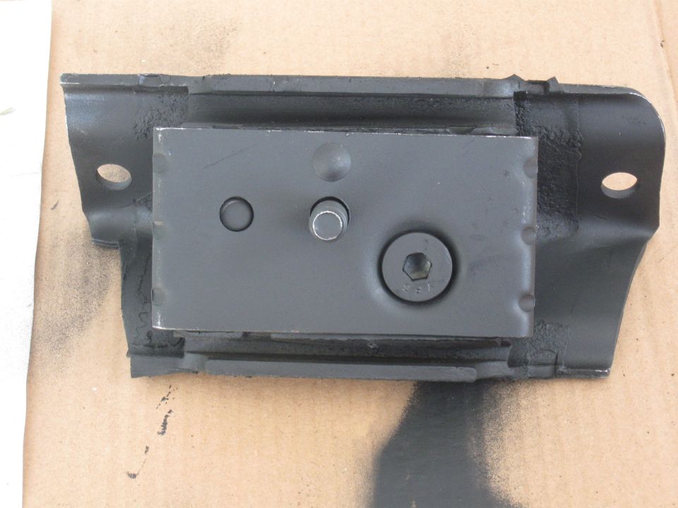 Black metal motor mount with rubber isolator, showing a hex bolt and two smaller pins