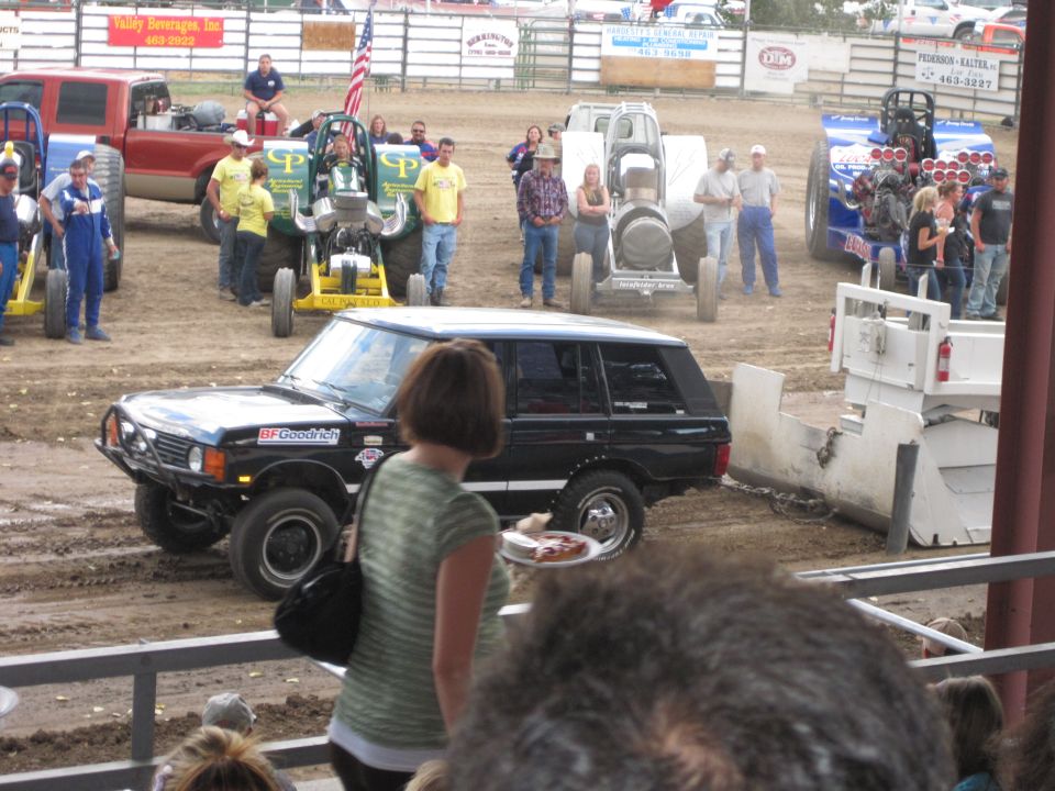 Black Range Rover SUV with BFGoodrich tires on a dirt track