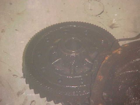 1996 Ford Bronco - Differential gear assembly, likely from a truck or SUV, covered in grease.
