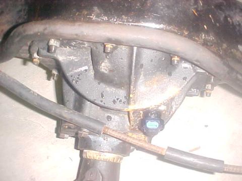 1996 Ford Bronco - This is a close-up view of a vehicle's differential assembly, showing various mechanical components.
