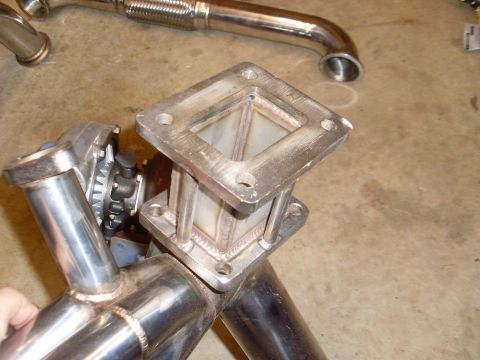 1985 Jeep CJ7 - This custom exhaust adapter appears to be part of a turbocharger setup, not a stock Jeep CJ7 component.