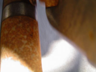 1995 Ford Bronco - A close-up view of a rusty steering gear box component, with a watermark from SUPERMOTORS.NET visible.