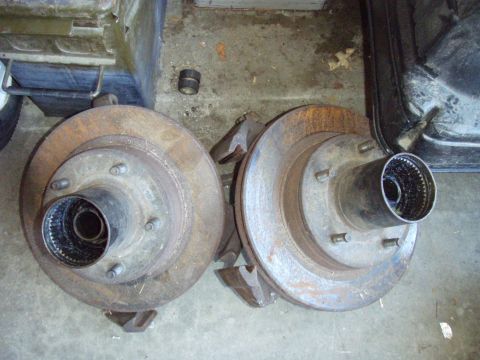 1994 Ford Bronco - Two rusty brake rotors with hubs are shown, likely for a truck or SUV.