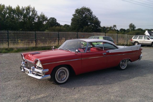 Red and white 1957 Dodge Custom Royal coupe, 3q front view