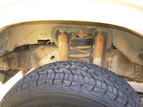 1983 Ford Bronco - The rubber coil spacers went in a LOT easier than I expected, simply by jacking the frame until the front wheels came off the ground. So fo…
