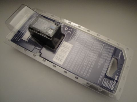 1993 Ford Taurus - A Sony NP-FH100 battery pack is displayed in its retail packaging.