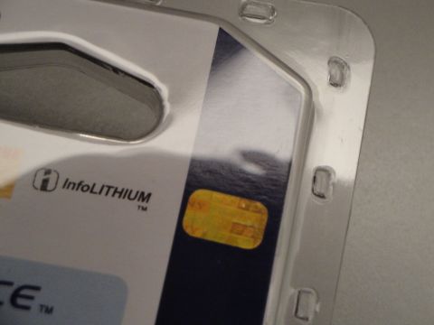 1993 Ford Taurus - Packaging for an InfoLithium battery shows a yellow chip and text.
