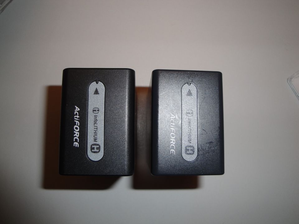 Two ActiFORCE InfoLITHIUM H camera batteries side-by-side
