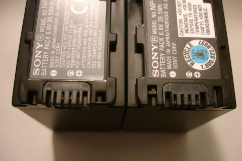 1993 Ford Taurus - Two Sony battery packs are shown side-by-side, displaying their model numbers and caution labels.