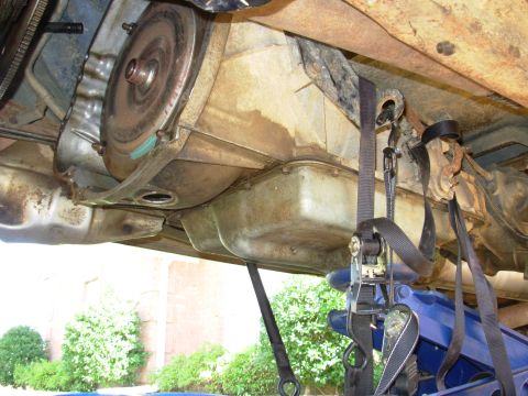 1993 Ford Bronco - Rather than drop this heavy beast all the way to the ground, I just left it on the jack and rolled it back enough to get the torque convert…