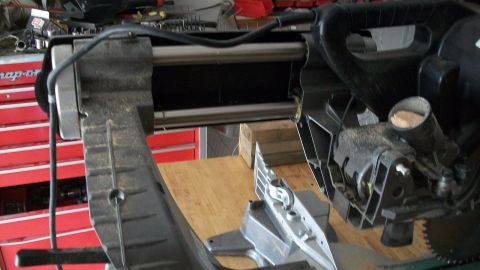 1986 Chevrolet Blazer - A miter saw is shown in a workshop setting, with a red toolbox visible in the background.