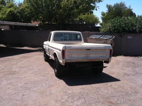 1979 Ford F-350 - Rear view of a white 1979 Ford F-350 pickup truck in a parking lot.