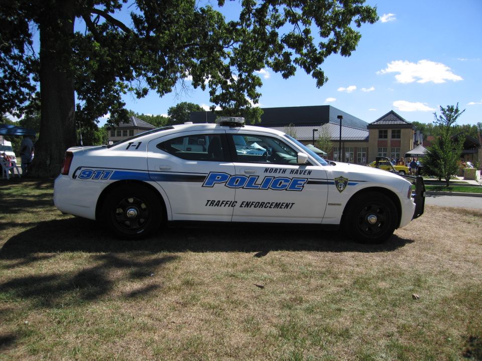 White North Haven Police Dodge Charger traffic enforcement car, side view