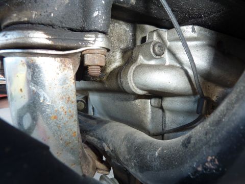 1978 Honda GL1000 - Detail shot of a motorcycle engine, showing mechanical parts and connections.
