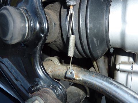 1978 Honda GL1000 - Detail of a motorcycle's mechanical components, including a spring and rubber boot.
