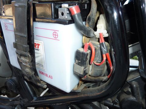 1978 Honda GL1000 - Close-up view of a motorcycle's battery and electrical connections, showing the battery and associated wiring within the frame.
