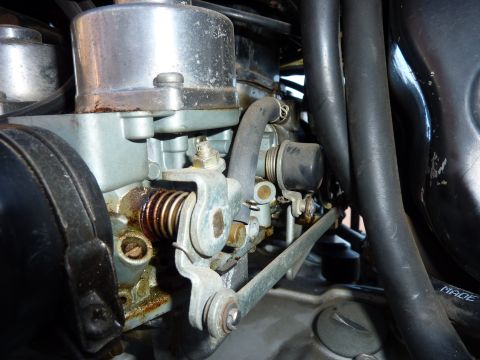 1978 Honda GL1000 - Detail of a motorcycle carburetor, showing mechanical components and fuel delivery system.