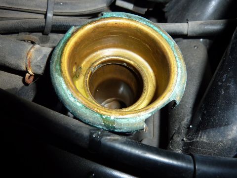 1978 Honda GL1000 - Close-up view of a corroded radiator cap opening, showing signs of wear and discoloration.