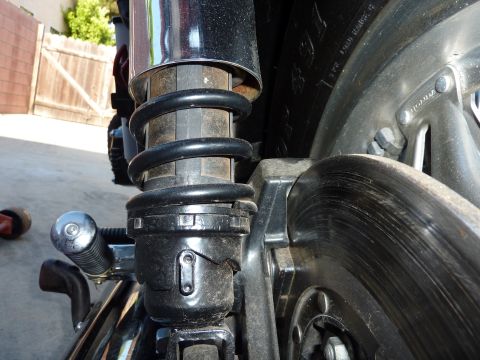 1978 Honda GL1000 - Detail shot of a motorcycle's rear suspension and braking components.