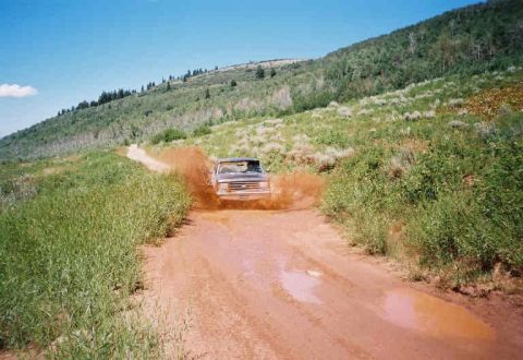 1991 Ford Bronco - Ford Bronco navigating a muddy trail during a run in Farmington Canyon.