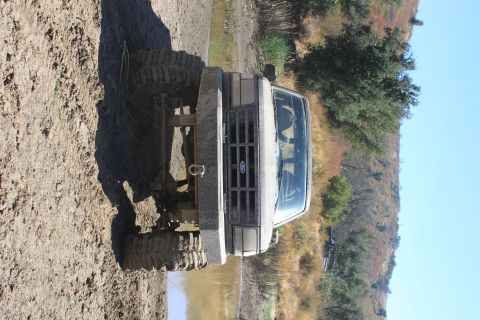 1992 Ford Bronco - This 1992 Ford Bronco is stuck in the mud after an off-road adventure.