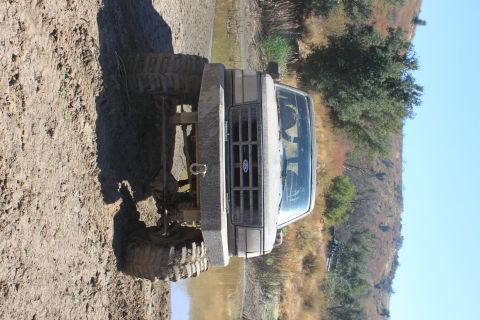 1992 Ford Bronco - This truck appears to be a Ford F-Series from the early 1990s, not a Bronco, based on its grille and body style.