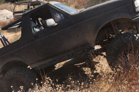 1992 Ford Bronco - This 1992 Ford Bronco navigates a , off-road trail.