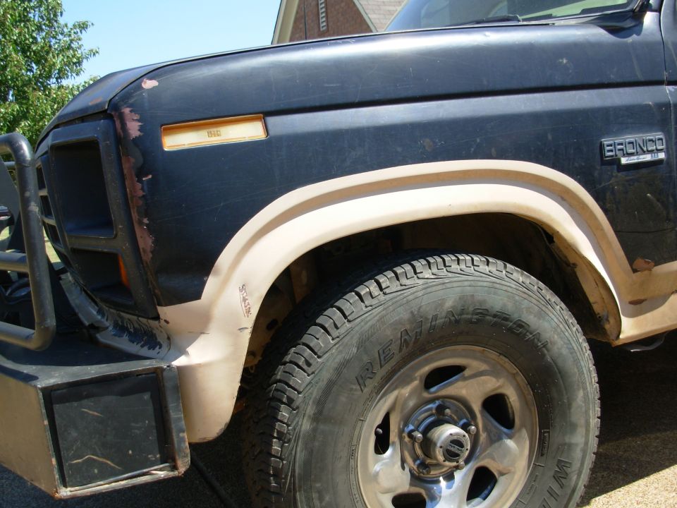 Not much difference after adding the rubber coil spacers, but that's exactly what I wanted.  They only increase the spring rate without any lift.  If the front bumper wasn't pulling it down that extra 3/4", these ~33" tires would fit without any help.