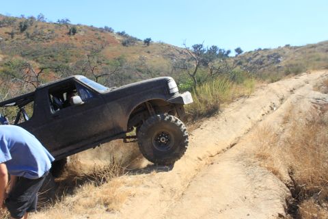 1992 Ford Bronco - This 1992 Ford Bronco is tackling a challenging off-road trail.