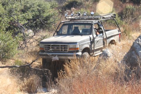1992 Ford Bronco - This Ford F-Series truck is equipped for off-road adventures with a custom roof rack and auxiliary lighting.