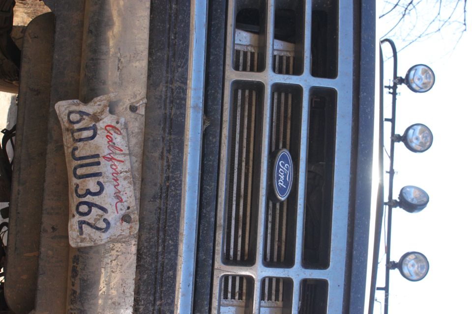1992 Ford Bronco grille with California license plate 6D JU362 and three spotlights