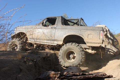 1992 Ford Bronco - A modified 1992 Ford Bronco navigates a challenging off-road course.