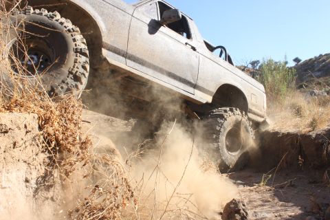 1992 Ford Bronco - This 1992 Ford Bronco is navigating a steep, dusty trail.