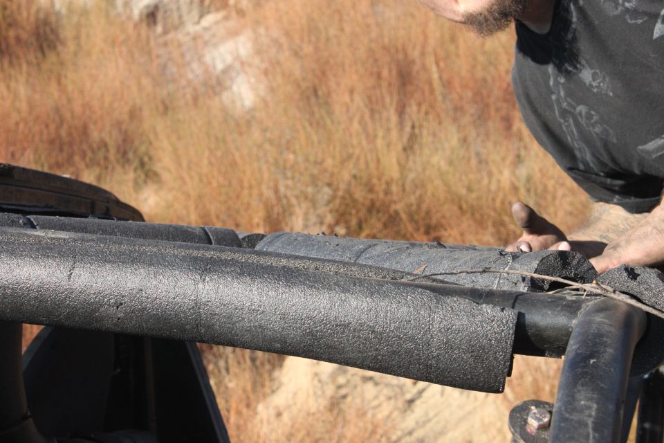 Roll bar padding on a vehicle with Supermotors.net logo
