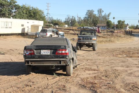 1992 Ford F-Series truck with roof rack, lifted suspension, and off-road tires