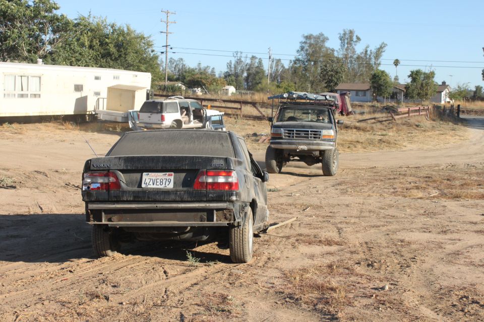 1992 Ford F-Series truck with roof rack, lifted suspension, and off-road tires