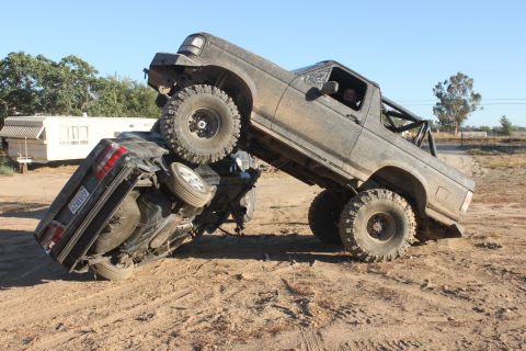 1992 Ford Bronco on top of another vehicle, 3q-front view