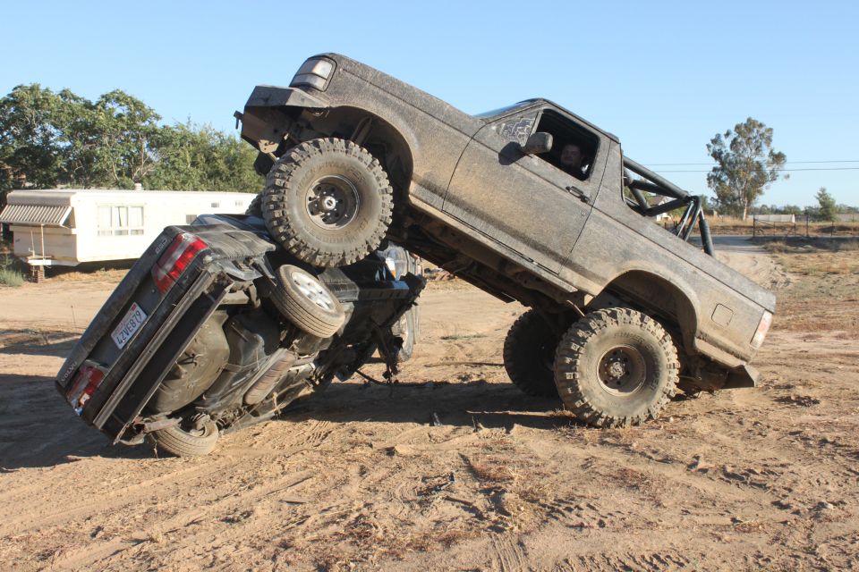 1992 Ford Bronco on top of another vehicle, 3q-front view