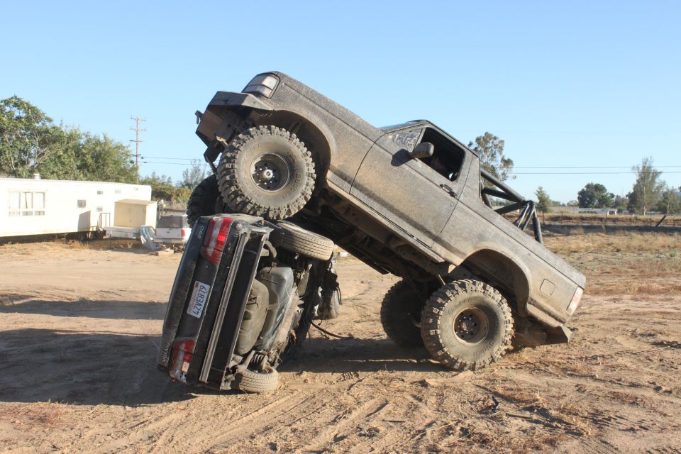 1992 Ford Bronco on top of another vehicle, 3q-front view