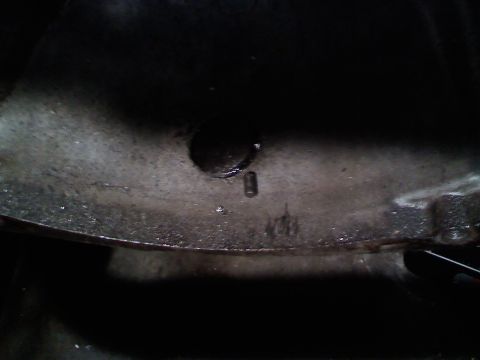1990 Ford Bronco - Close-up view of a vehicle part showing the numbers '406' stamped into the metal.