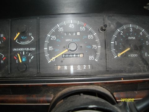 1990 Ford Bronco - Interior view of a 1990 Ford Bronco's dashboard gauges, including the odometer reading.