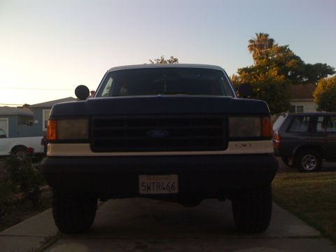 1989 Ford Bronco - Front view of a 1989 Ford Bronco parked in a driveway.